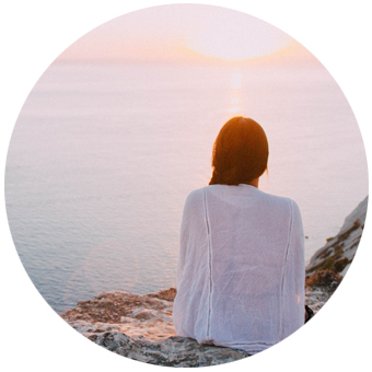 woman watching sunset - Light therapy for Health Wellness Consciousness Expansion - London Herts Essex - Lucia No3